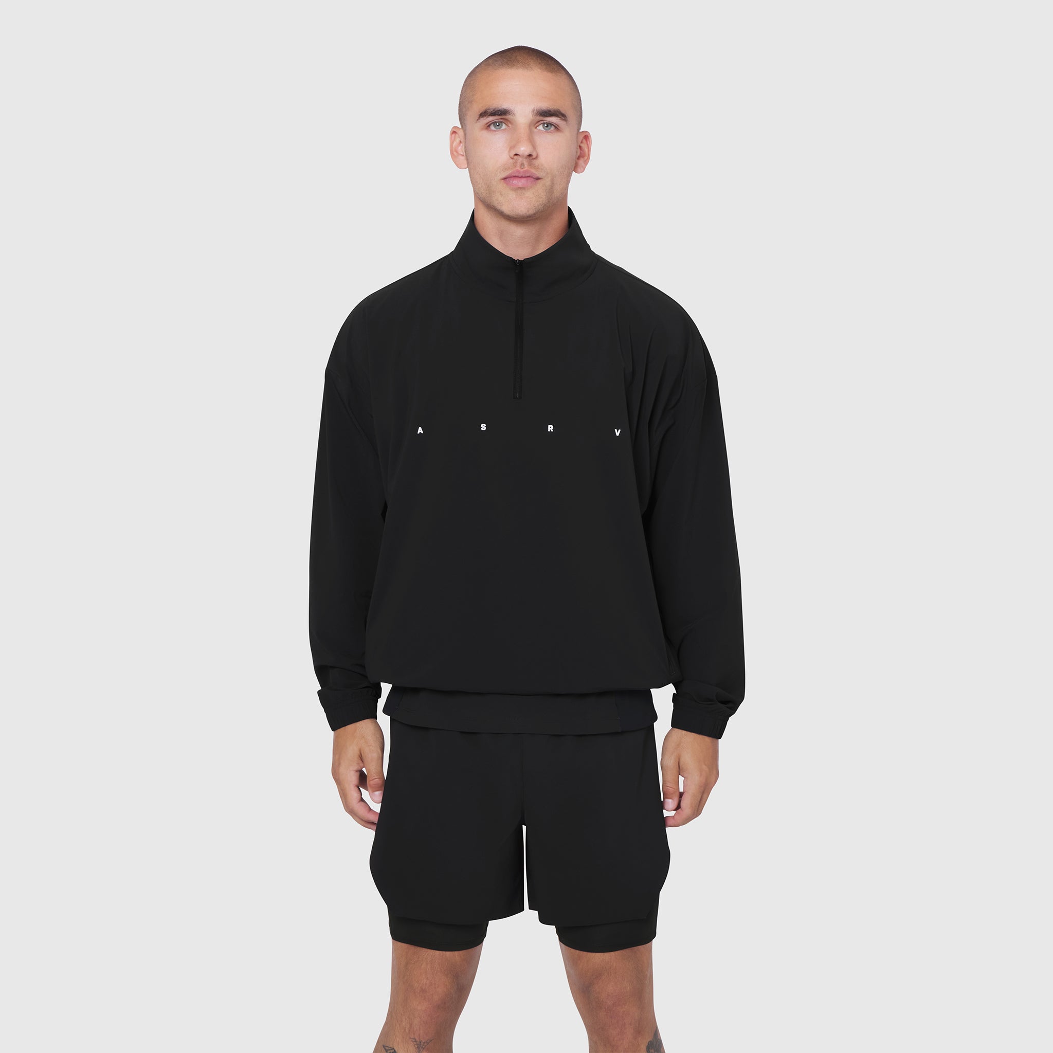 Black Aerotex Quarter-Zip Jacket worn by male model, front view