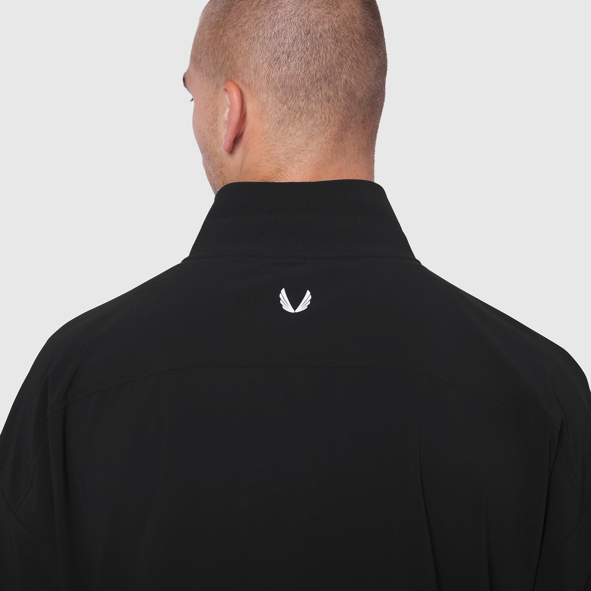 Aerotex Quarter-Zip Jacket in black, back view on model