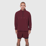 Aerotex Quarter-Zip Jacket in crimson worn with matching shorts, front view on model