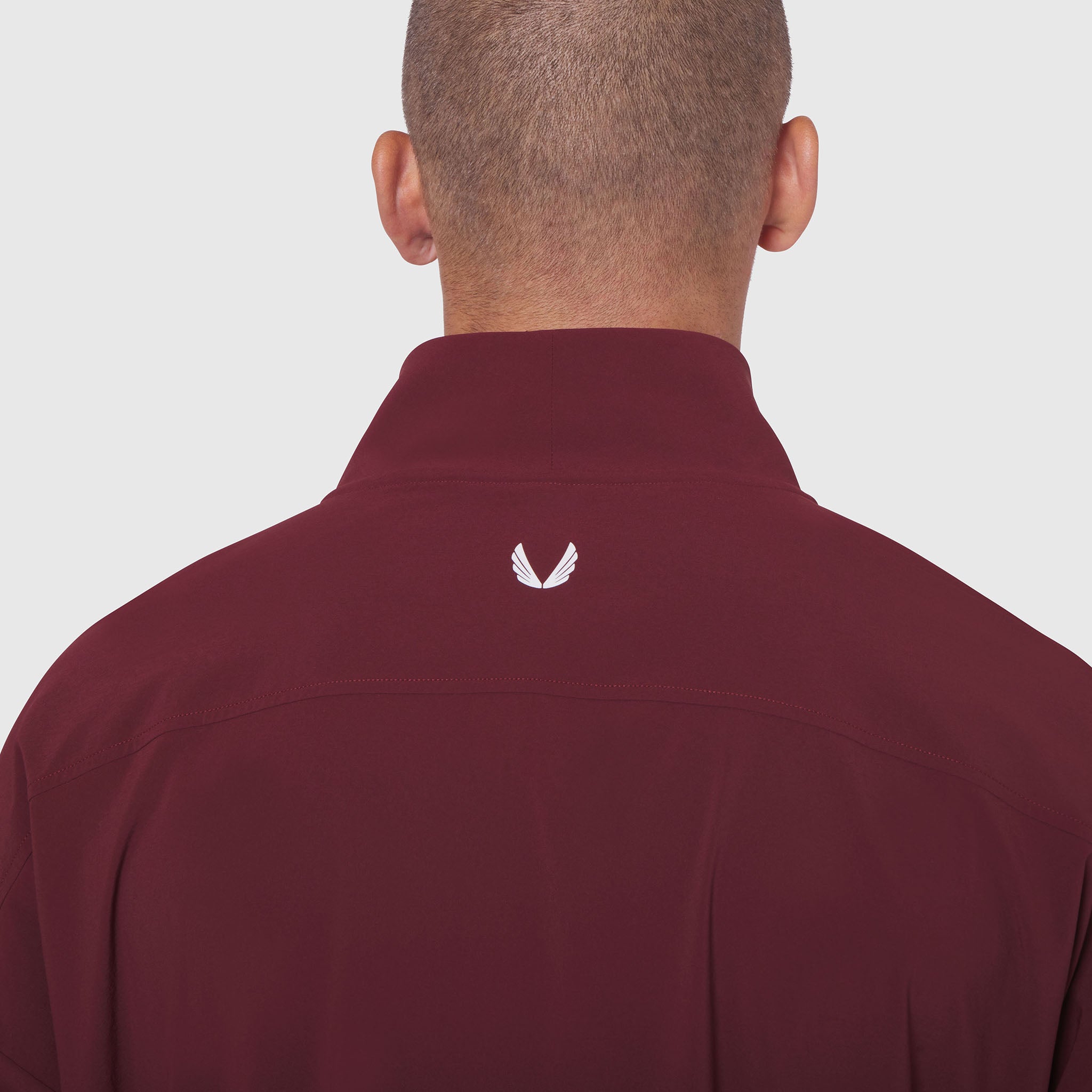 Aerotex Quarter-Zip Jacket in crimson, back view on model