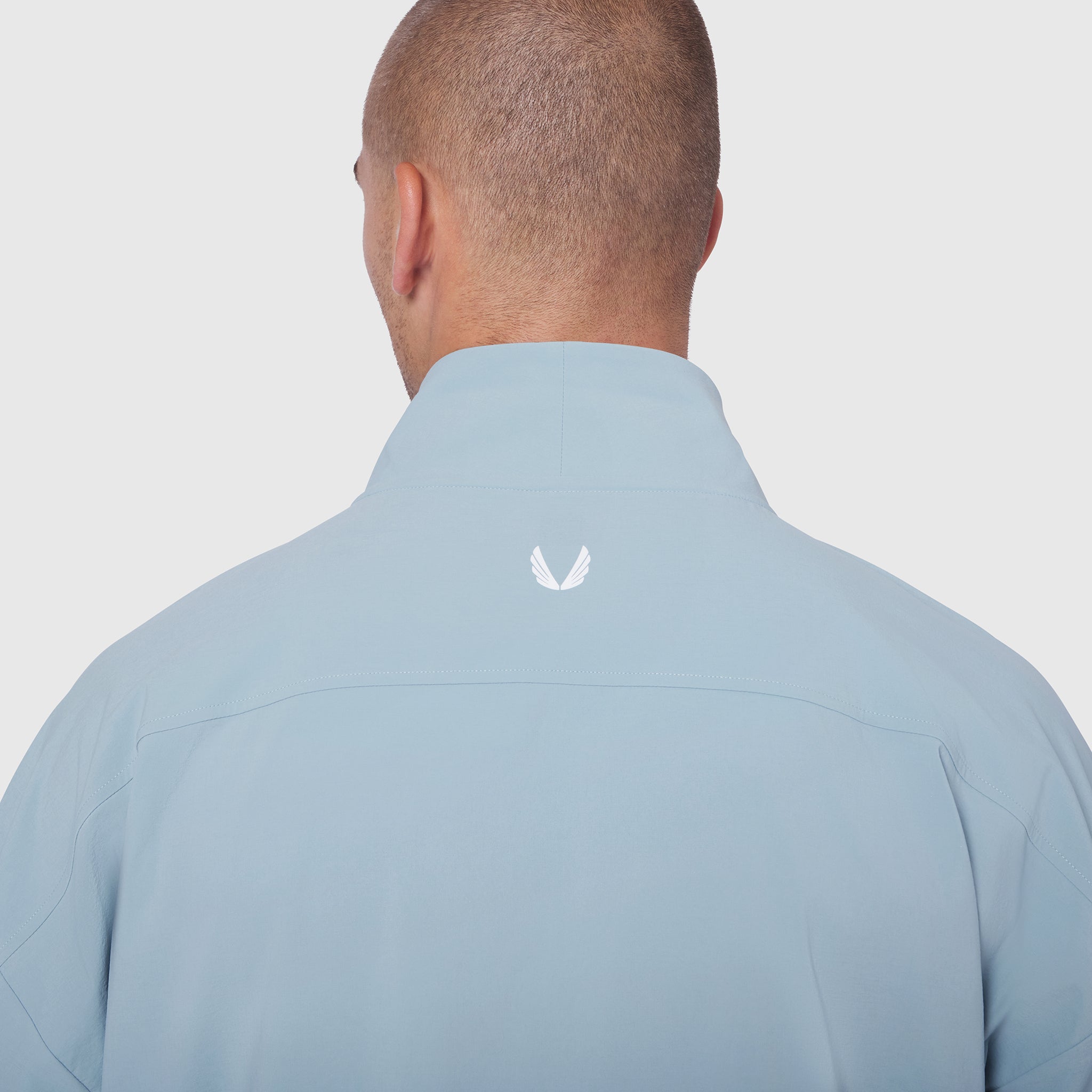 Aerotex Quarter-Zip Jacket in Light Sky, back view on model