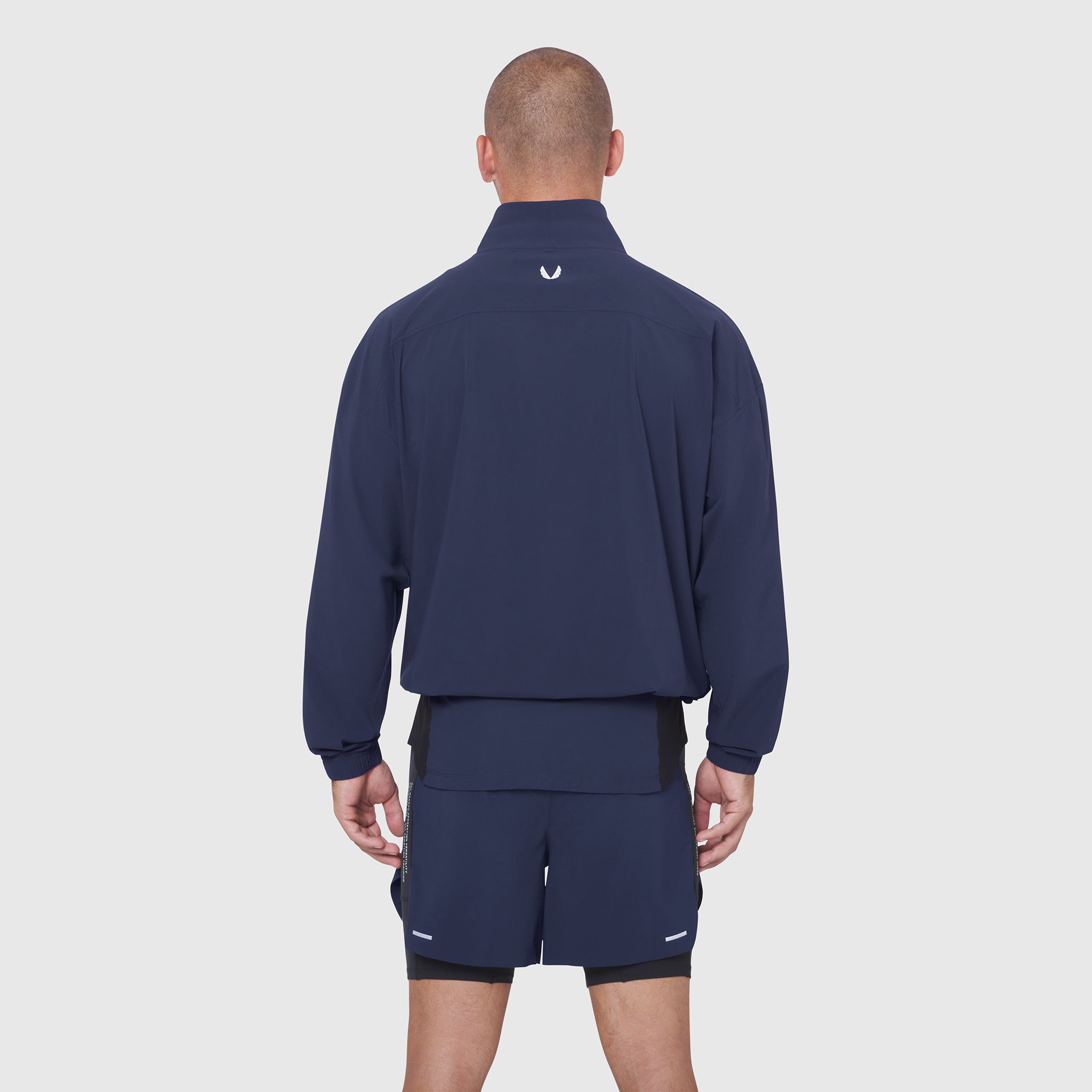 Aerotex Quarter-Zip Jacket in navy worn by model, back view