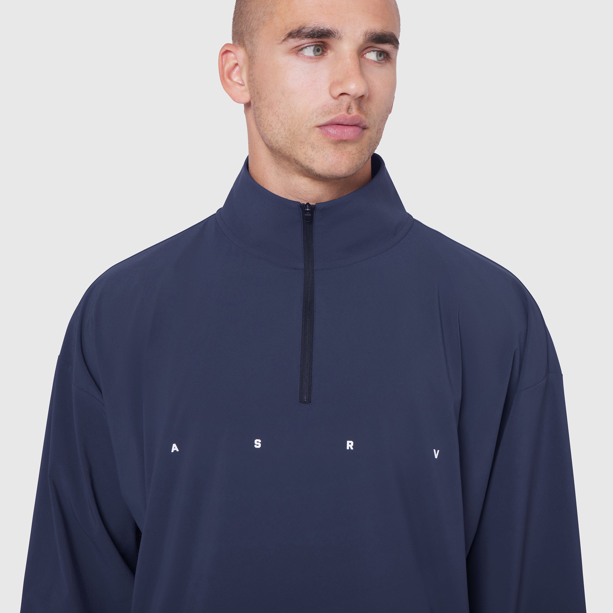 Aerotex Quarter-Zip Jacket in navy worn by model, front view