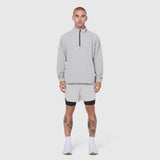 Aerotex Quarter-Zip Jacket in slate grey worn with matching shorts, front view on model