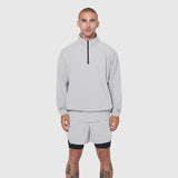Aerotex Quarter-Zip Jacket in slate grey worn with matching shorts, front view