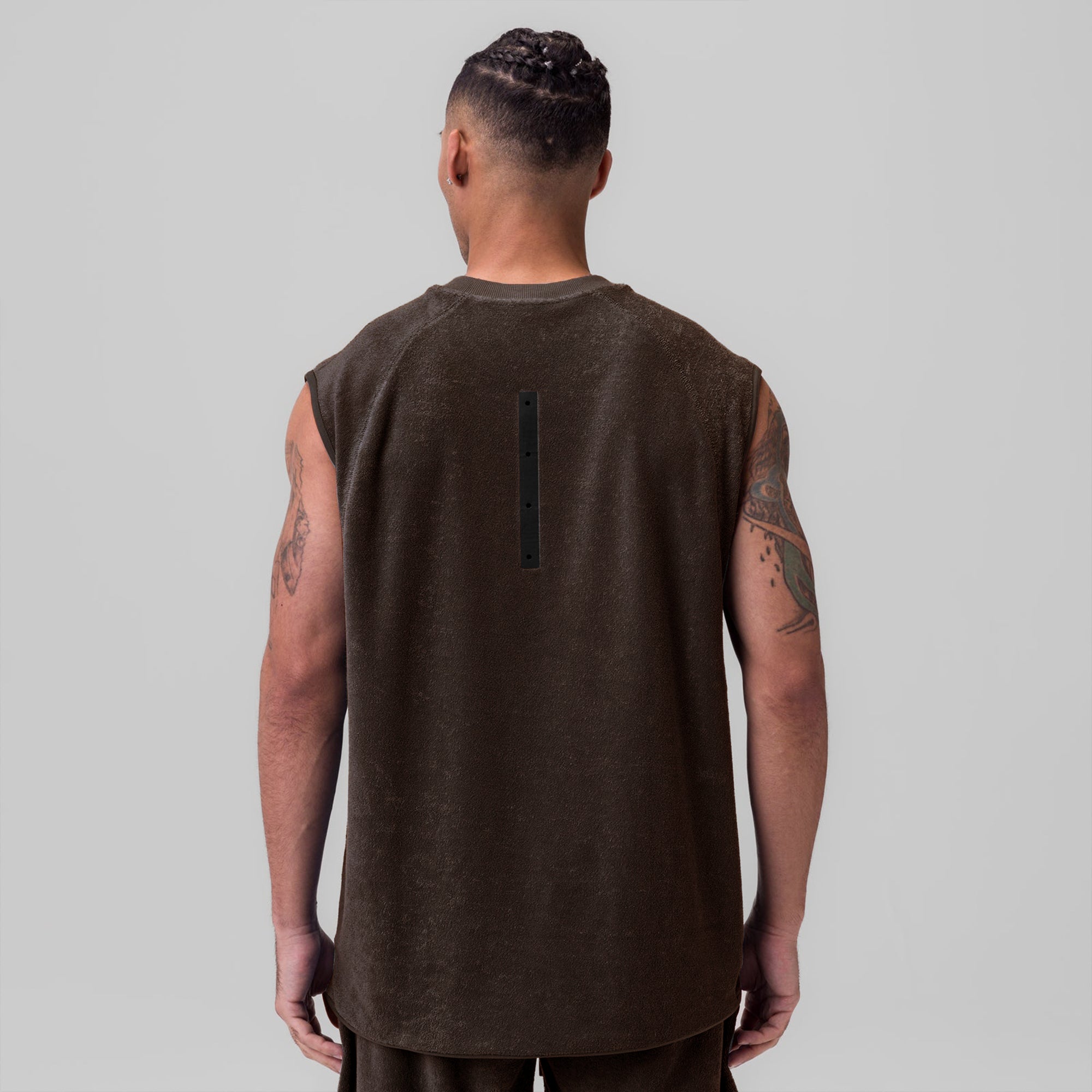 Towel Terry Cutoff sleeveless tank in dark earth, back view on model