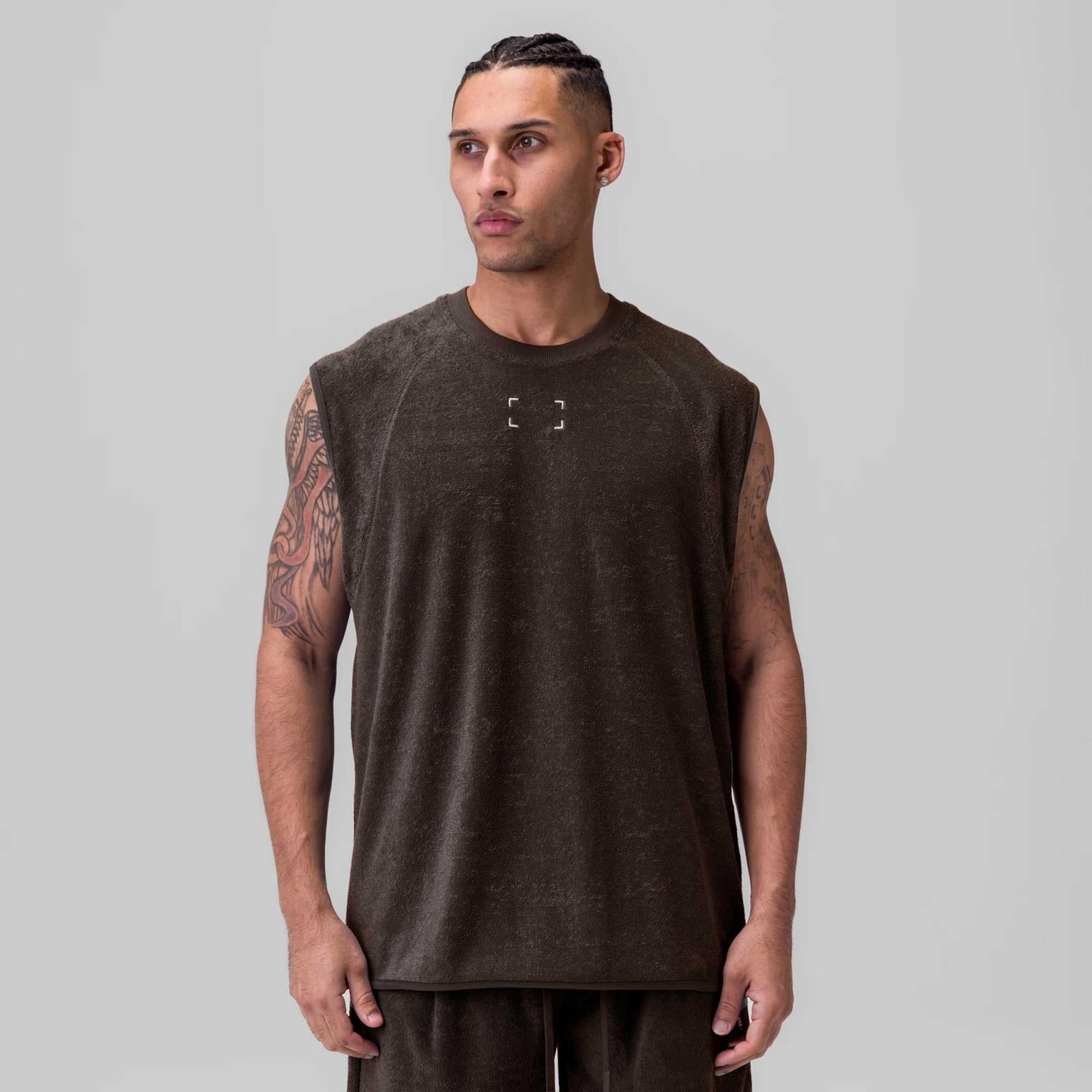 Towel Terry Cutoff sleeveless tee in Dark Earth, worn by model facing forward