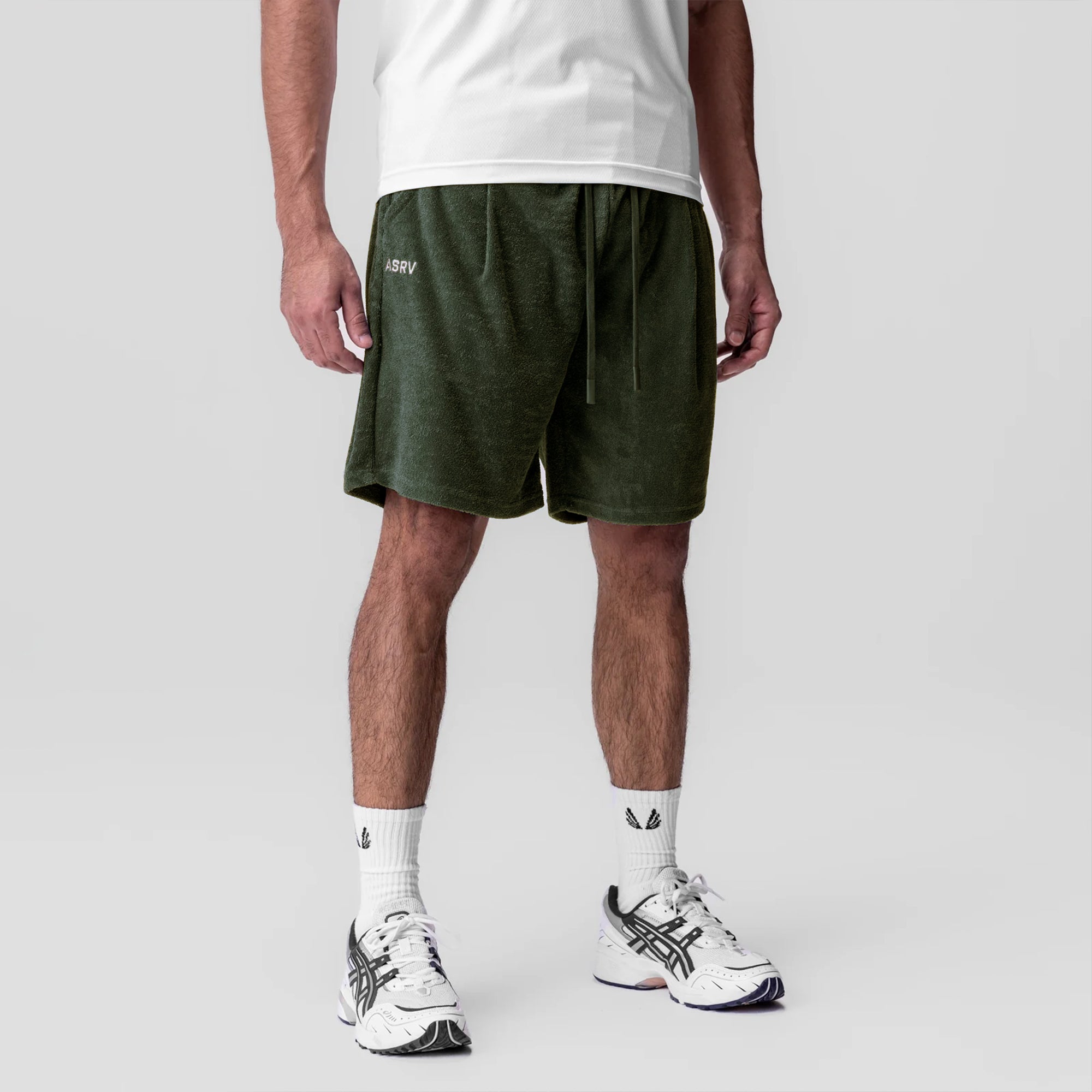 Towel Terry Relaxed Short in olive worn by model with white tee and white sneakers, front view