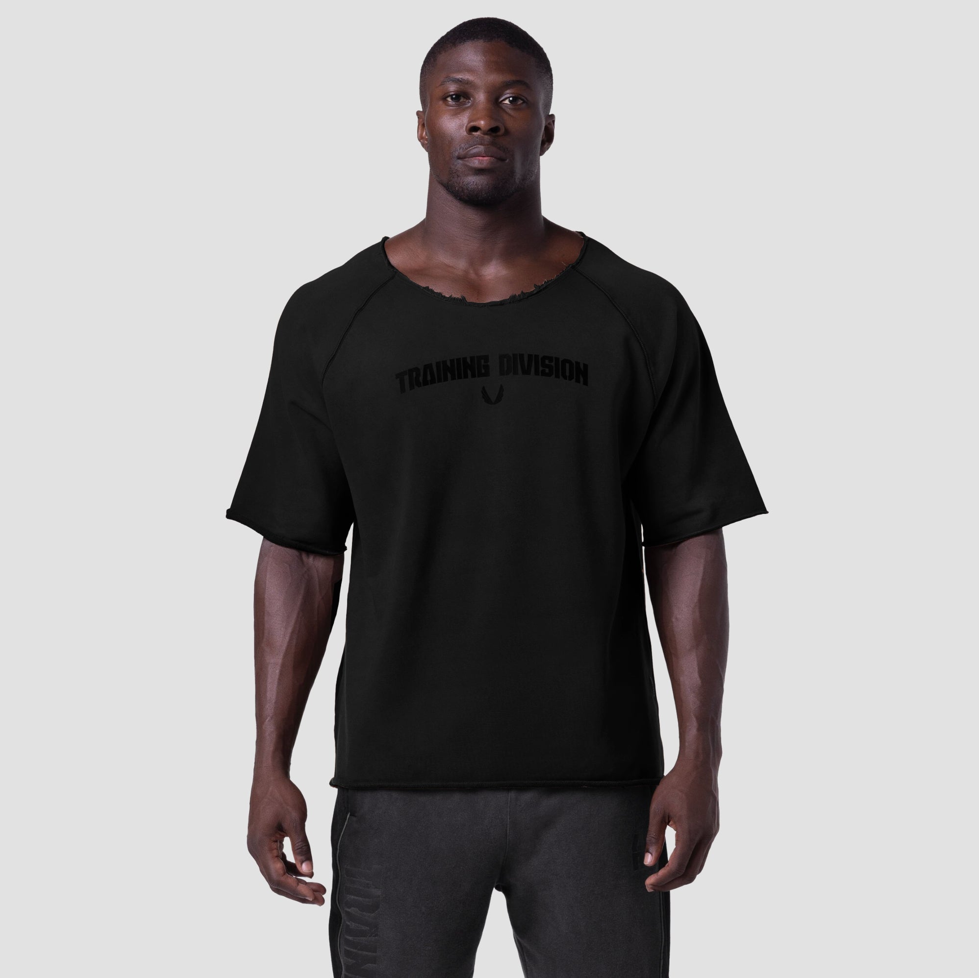 Black 'Training Division' t-shirt worn by male model, front view