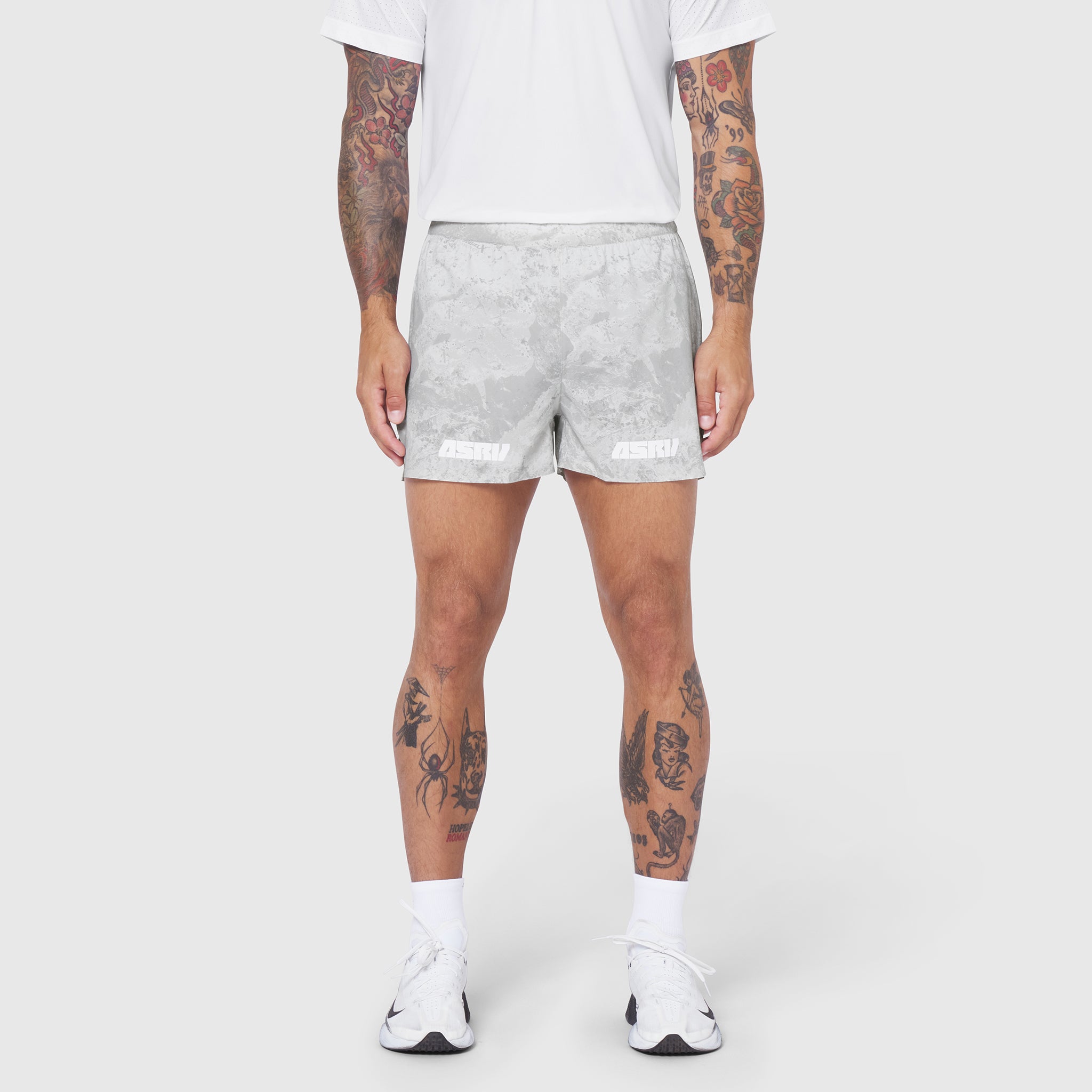 Aerotex Distance Short in white camo, worn by model standing facing forward