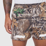 Aerotex Distance Short in Realtree Edge camo, modeled on person showing side view