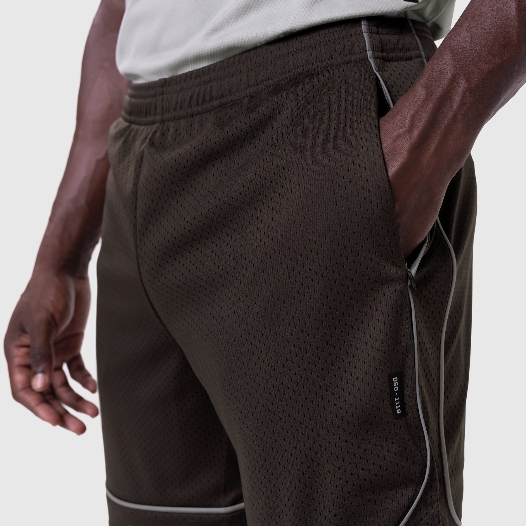 Ion-Mesh Modal Liner Short in Dark Earth worn by model, side view detail