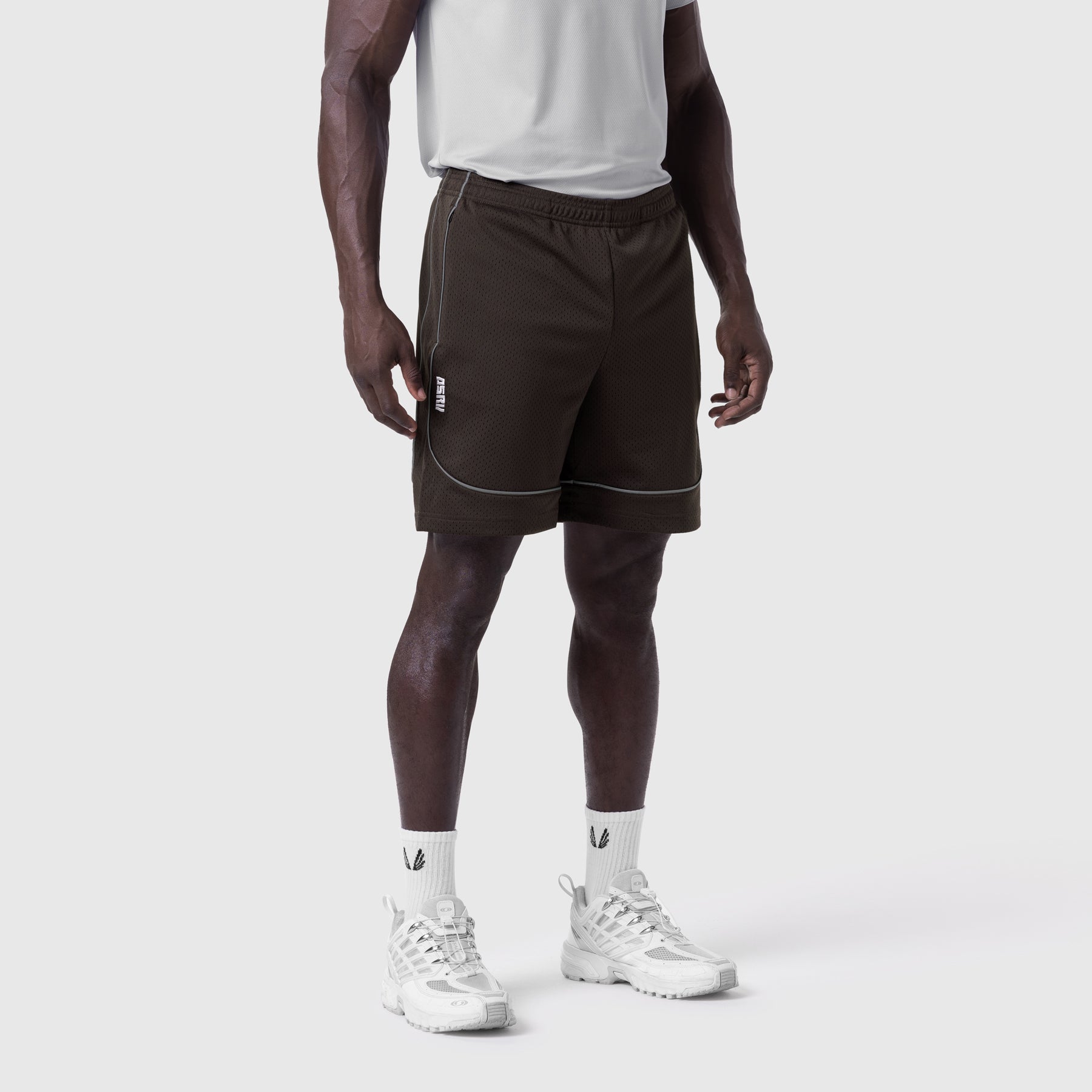 Ion-Mesh™ Modal Liner Short in Dark Earth, modeled from front with white socks and sneakers