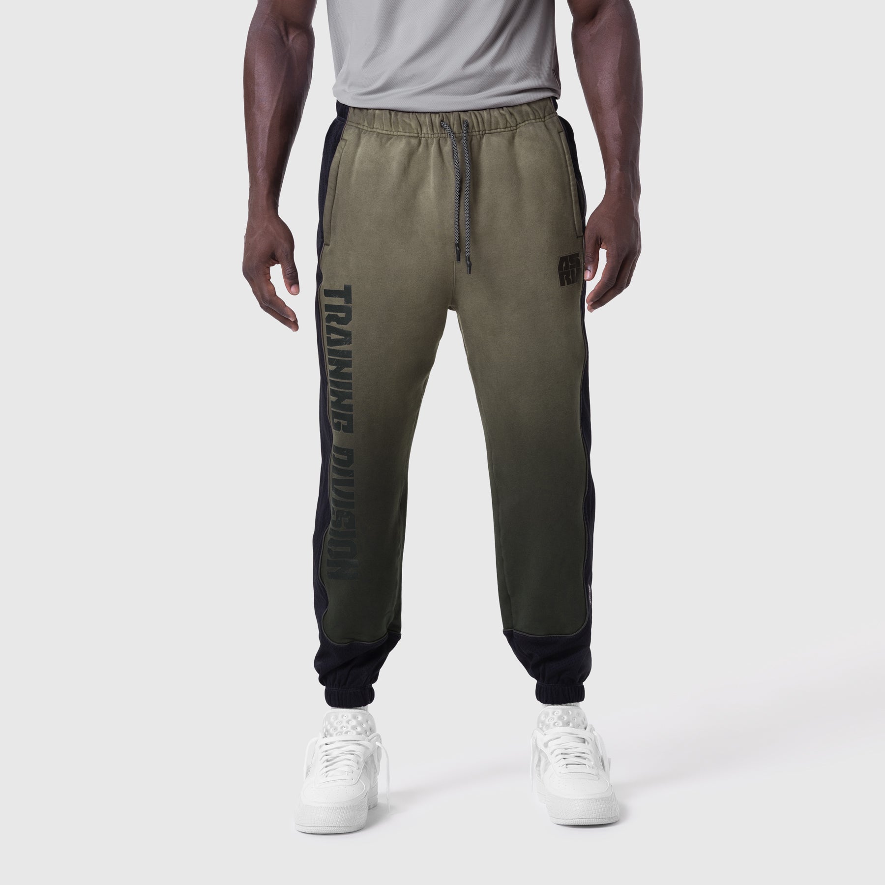 Tech-Terry Mesh Panel Sweats in olive with black panels, worn by model, front view