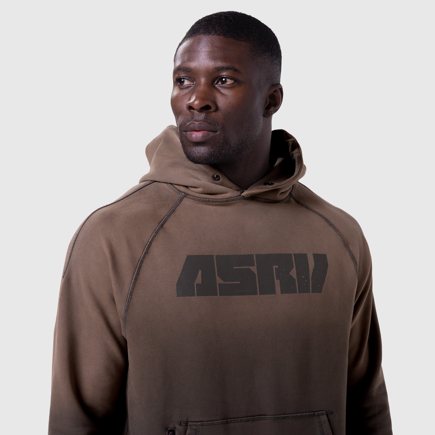 Tech-Terry Training Hoodie in dark earth, worn by model, front view