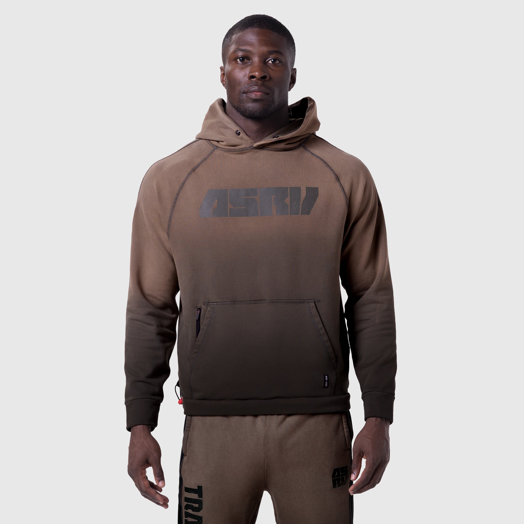 Tech-Terry Training Hoodie in dark earth, front view on model