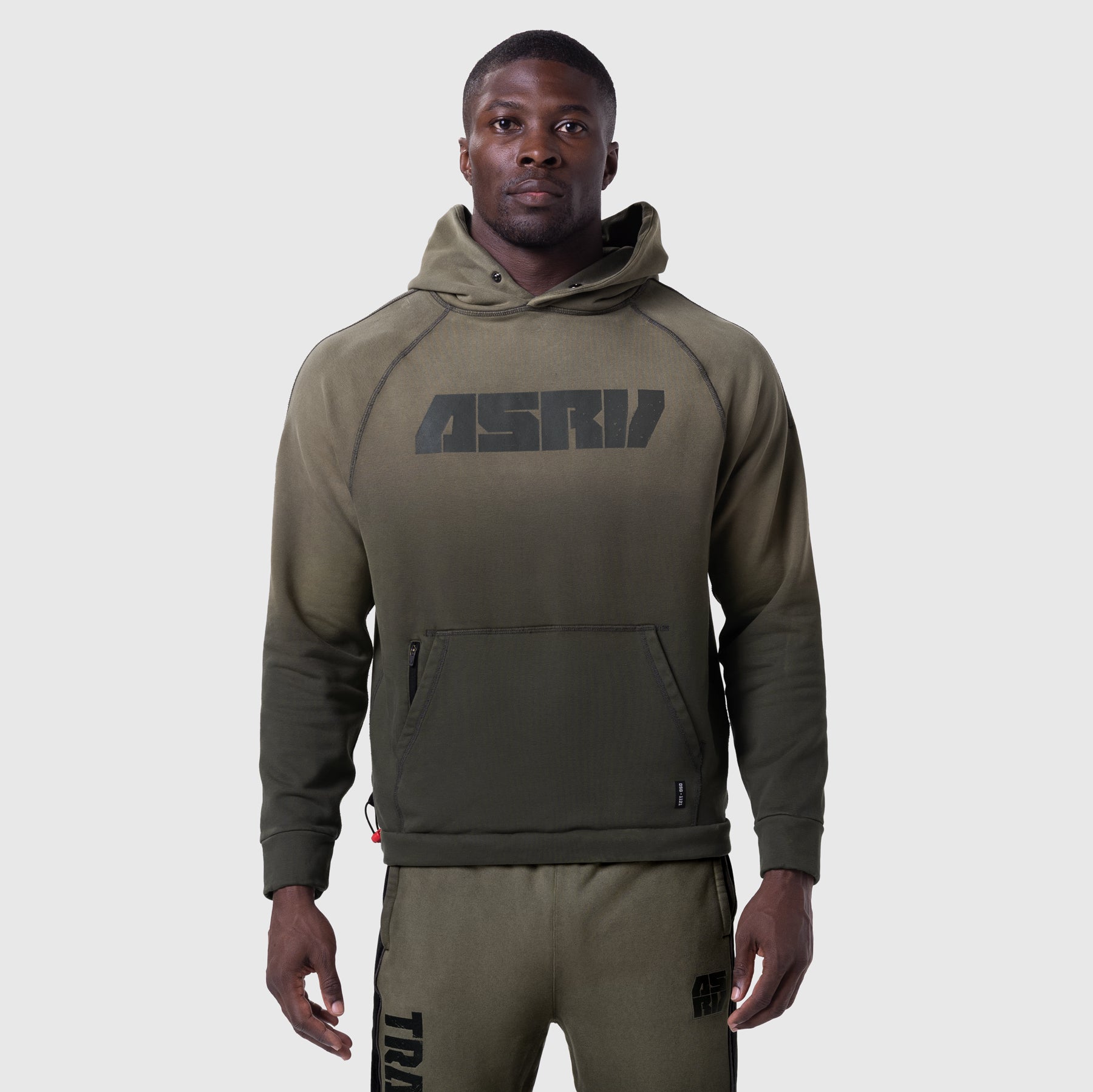 Tech-Terry Training Hoodie in olive, worn by model, front view