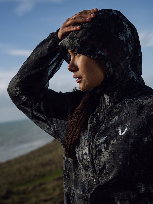 Adjustable hood with integrated drawcord system