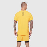 Laser-Vent Training Tee in amber yellow worn by model, back view