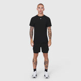 Black Laser-Vent Training Tee worn with black shorts, front view on model