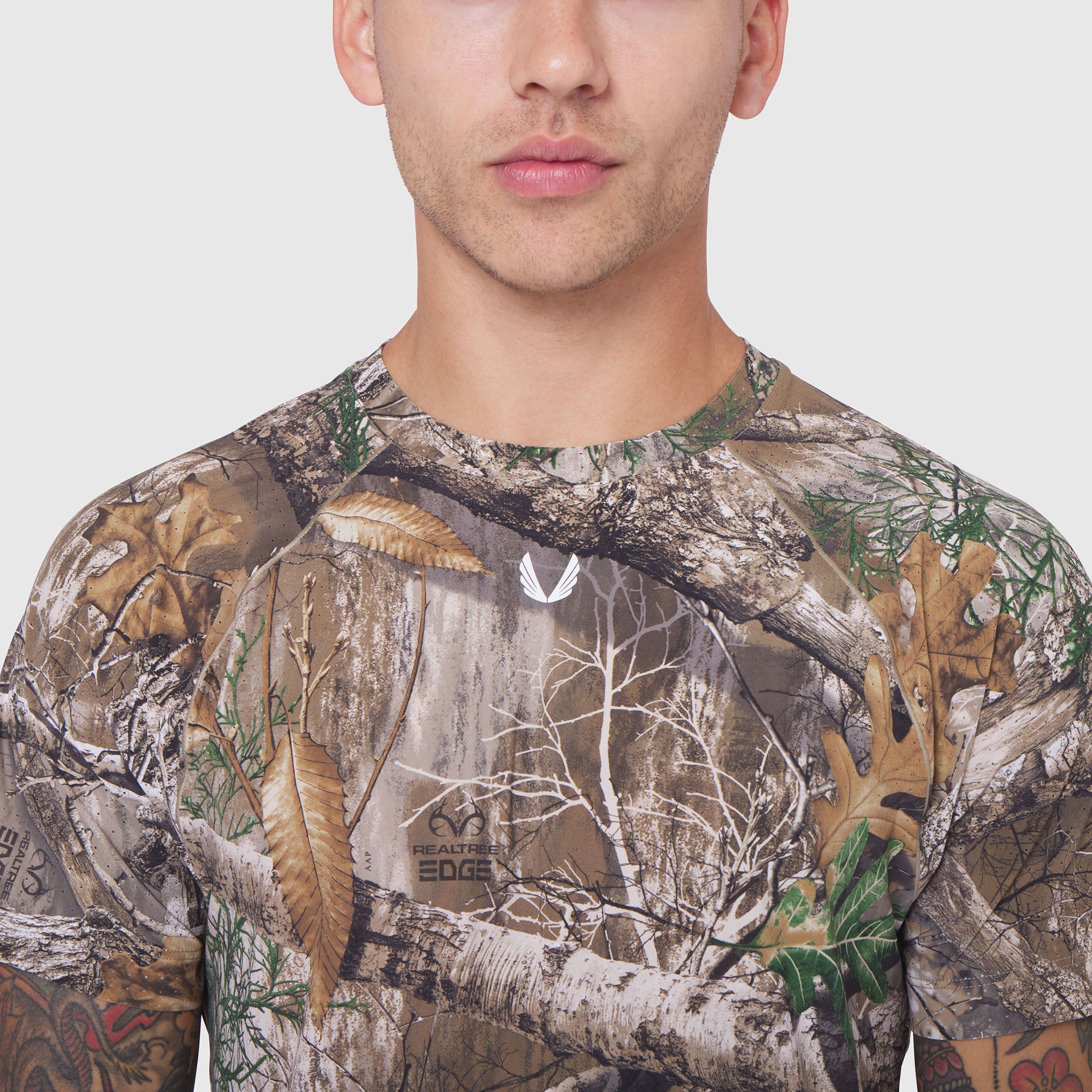 Laser-Vent Training Tee in Realtree Edge camo, worn by model, front view