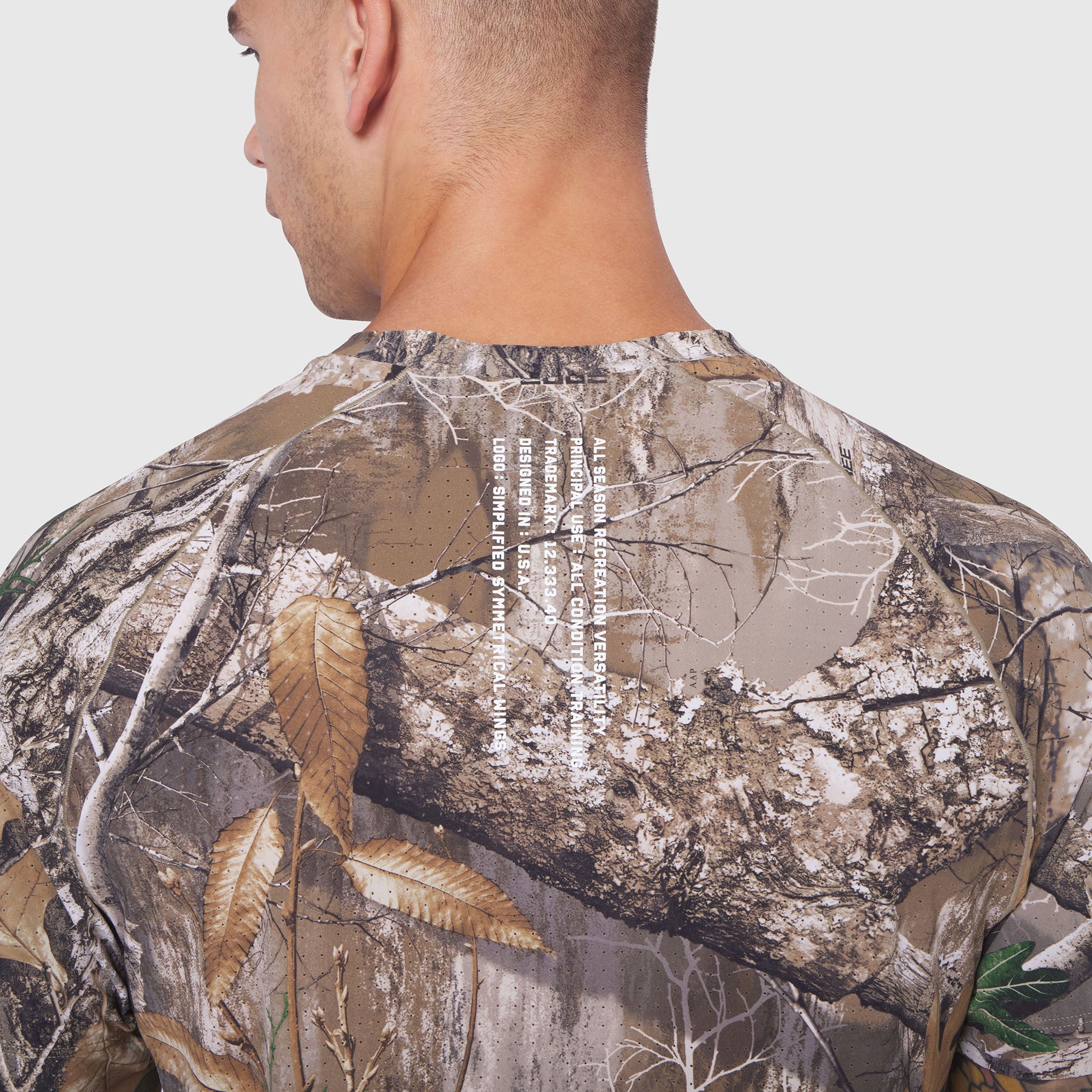 Laser-Vent Training Tee in Realtree Edge camo, back view on model