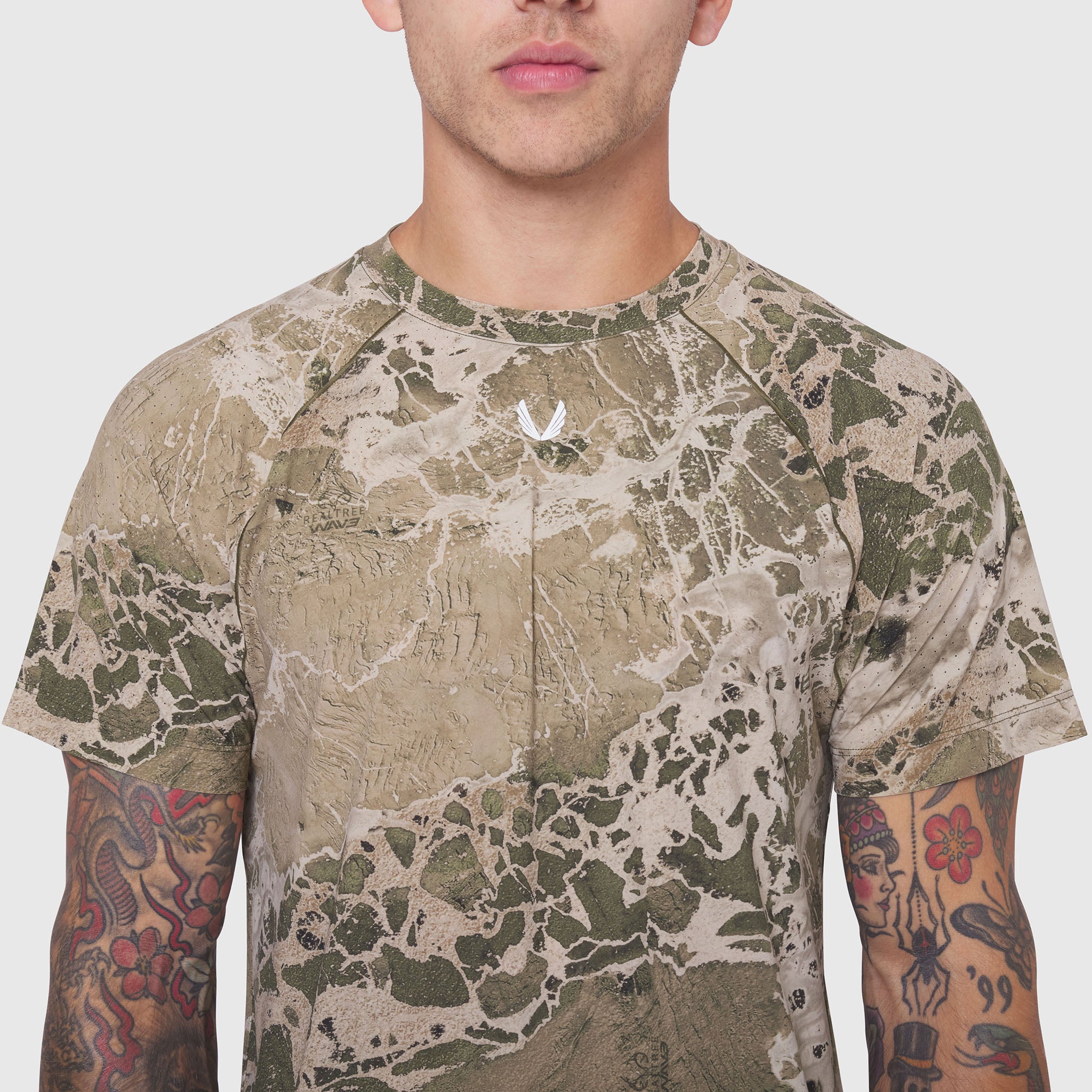 Laser-Vent Training Tee in camo print, worn by model showing front view