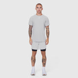 Laser-Vent Training Tee in slate grey worn with matching shorts, front view