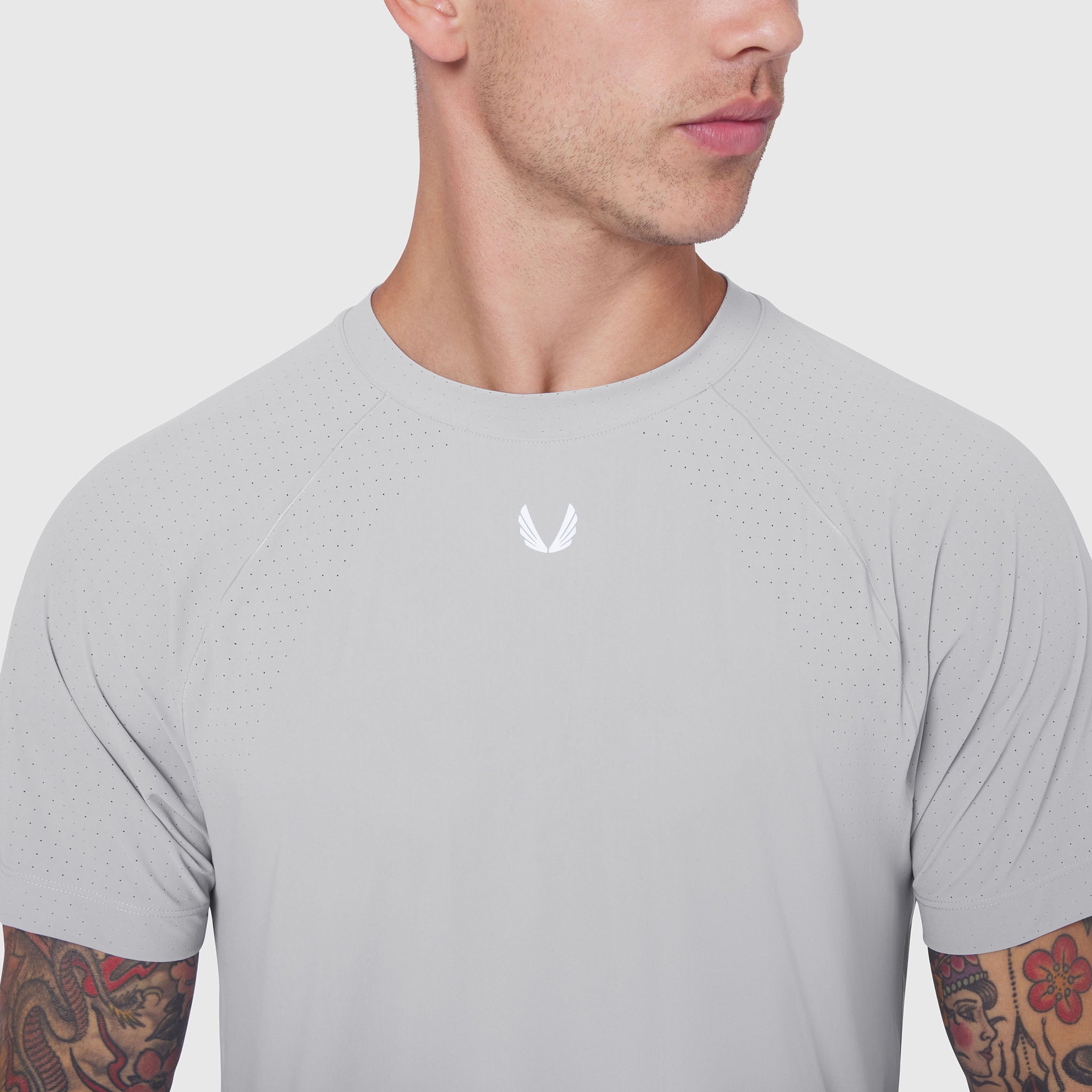 Laser-Vent Training Tee in slate grey worn by male model, front view