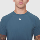 Laser-Vent Training Tee in storm blue worn by male model, front view