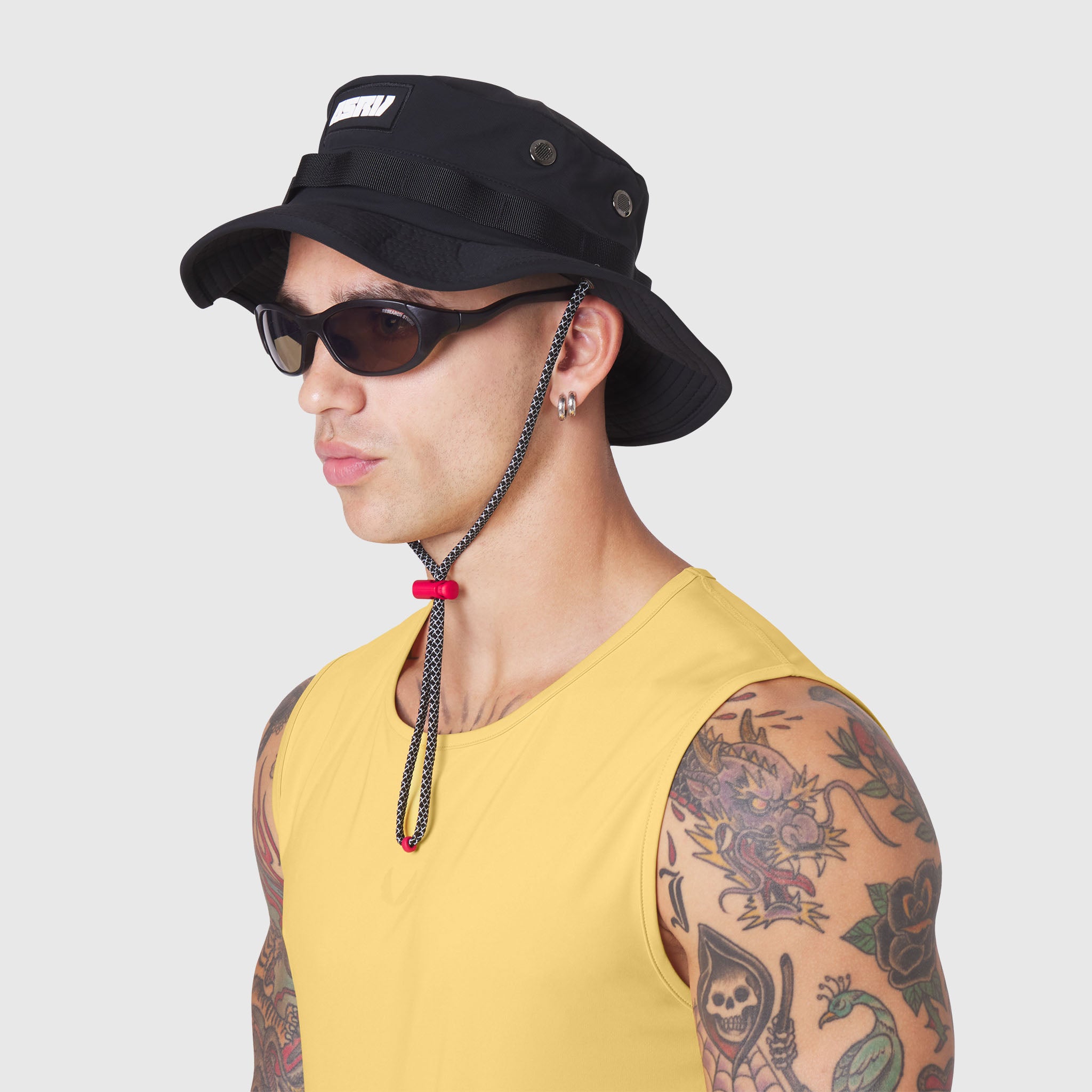 TETRA-LITE® Boonie Hat in black, worn by model with chain strap