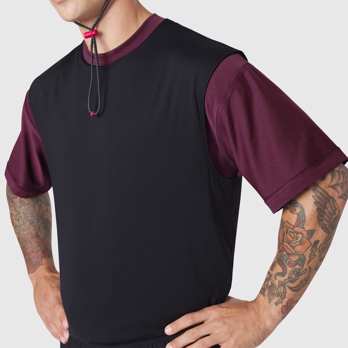 Supima Ice-Skin Reversible Tee in merlot and black worn by model, front view