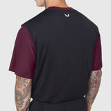 Supima Ice-Skin Reversible Tee in merlot and black, worn by model shown from back