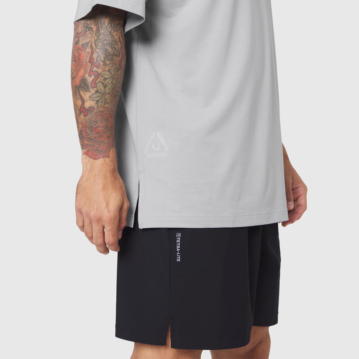 Supima Ice-Skin Reversible Tee in slate grey worn with black shorts, side view on model