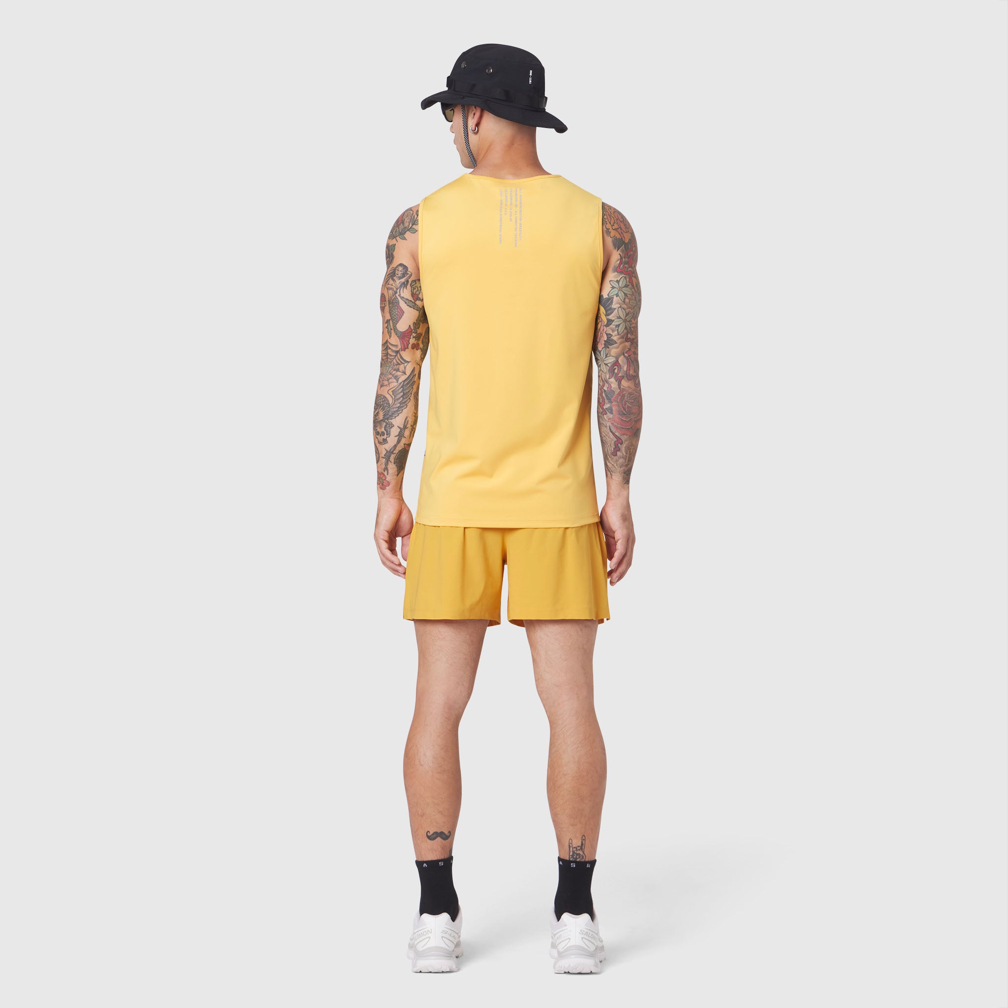 Warpflexx-Lite® Training Tank in amber yellow, back view on model