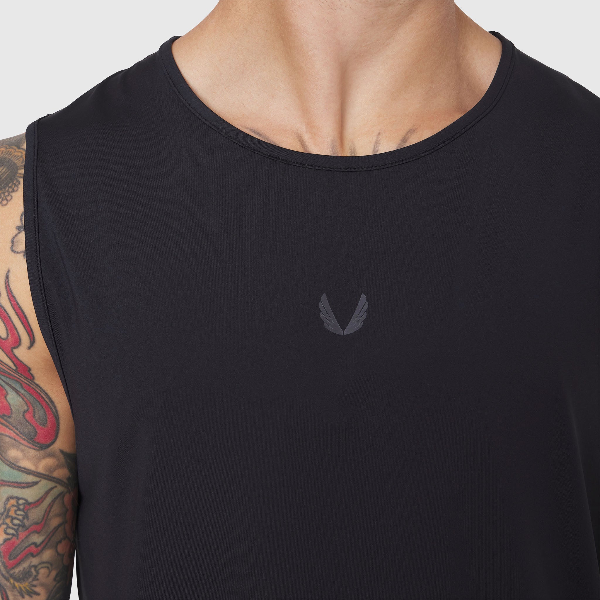Black Warpflexx-Lite Training Tank worn by model, front view