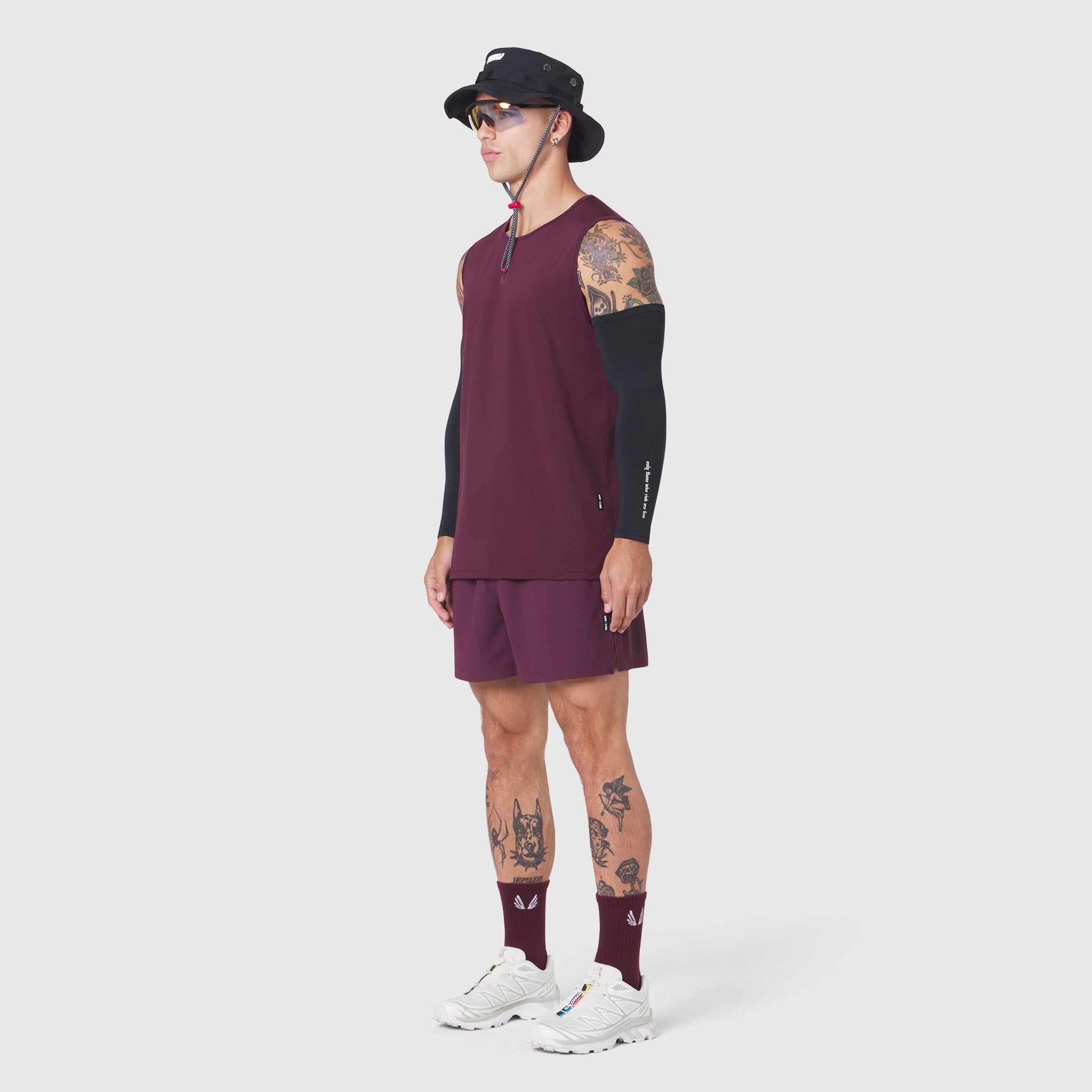 Warpflexx-Lite Training Tank in merlot worn with matching shorts, modeled on figure