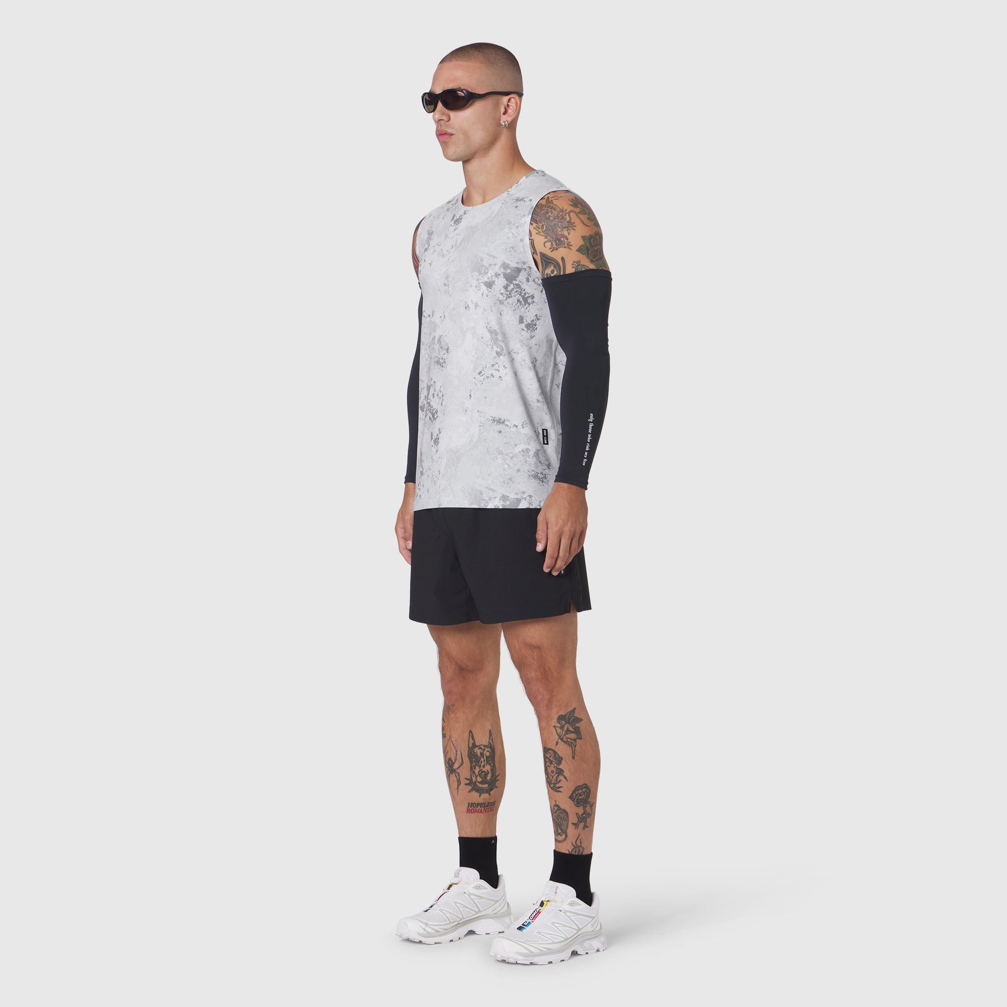 Warpflexx-Lite® Training Tank in Sedona Snow Camo worn with black shorts, side view