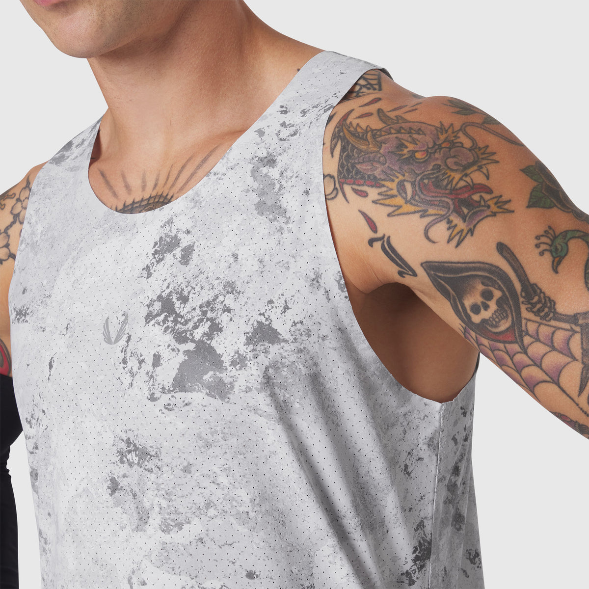 Aerotex Perforated Run Tank in Sedona Snow Camo worn by model, front view