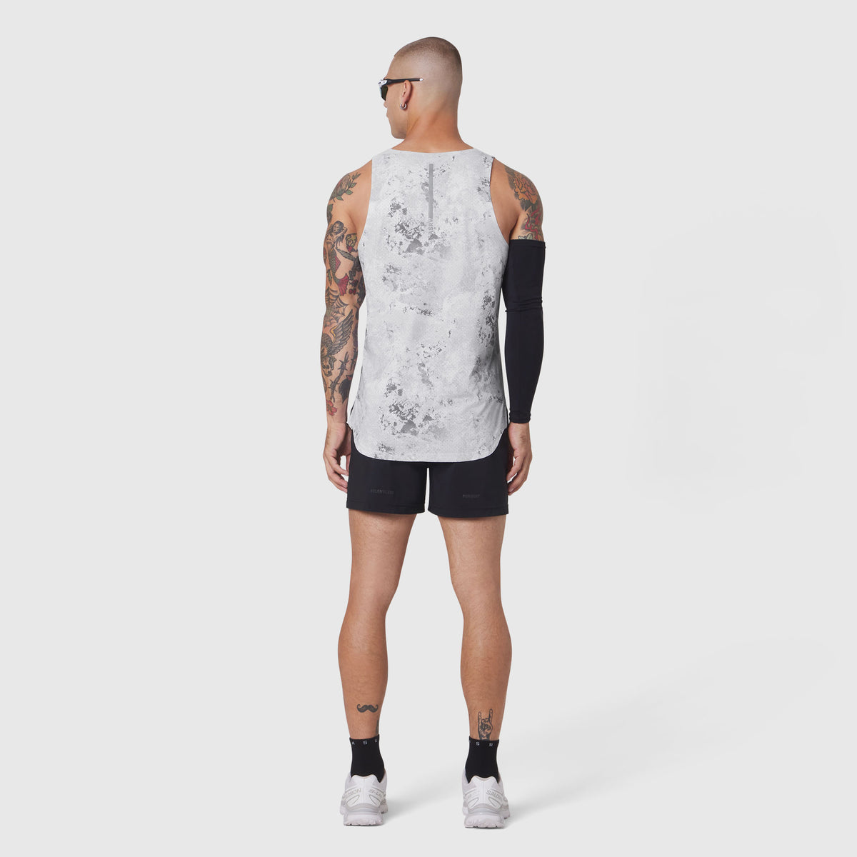 Aerotex Perforated Run Tank in Sedona Snow Camo worn by model, back view
