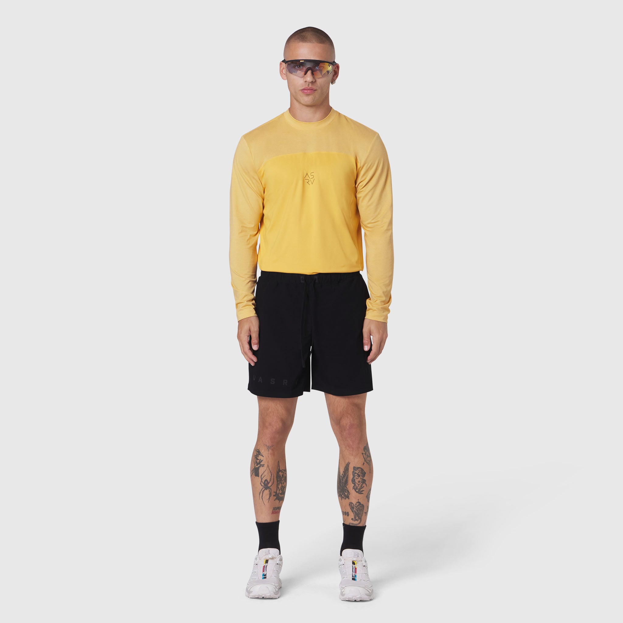 AEROSILVER® UPF50+ Run Long Sleeve in amber worn with black shorts, front view
