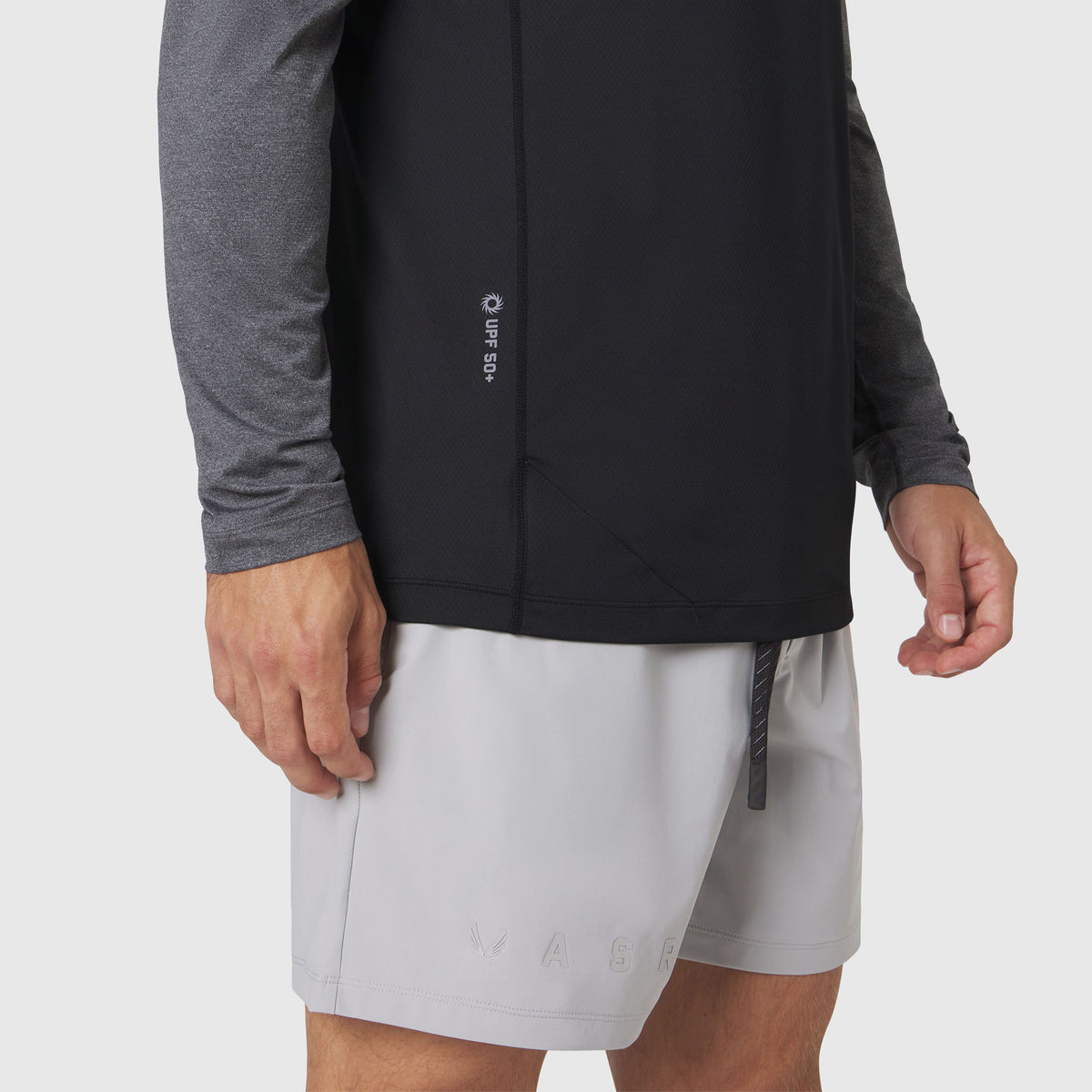AEROSILVER UPF50+ Run Long Sleeve in black worn with white shorts, side view