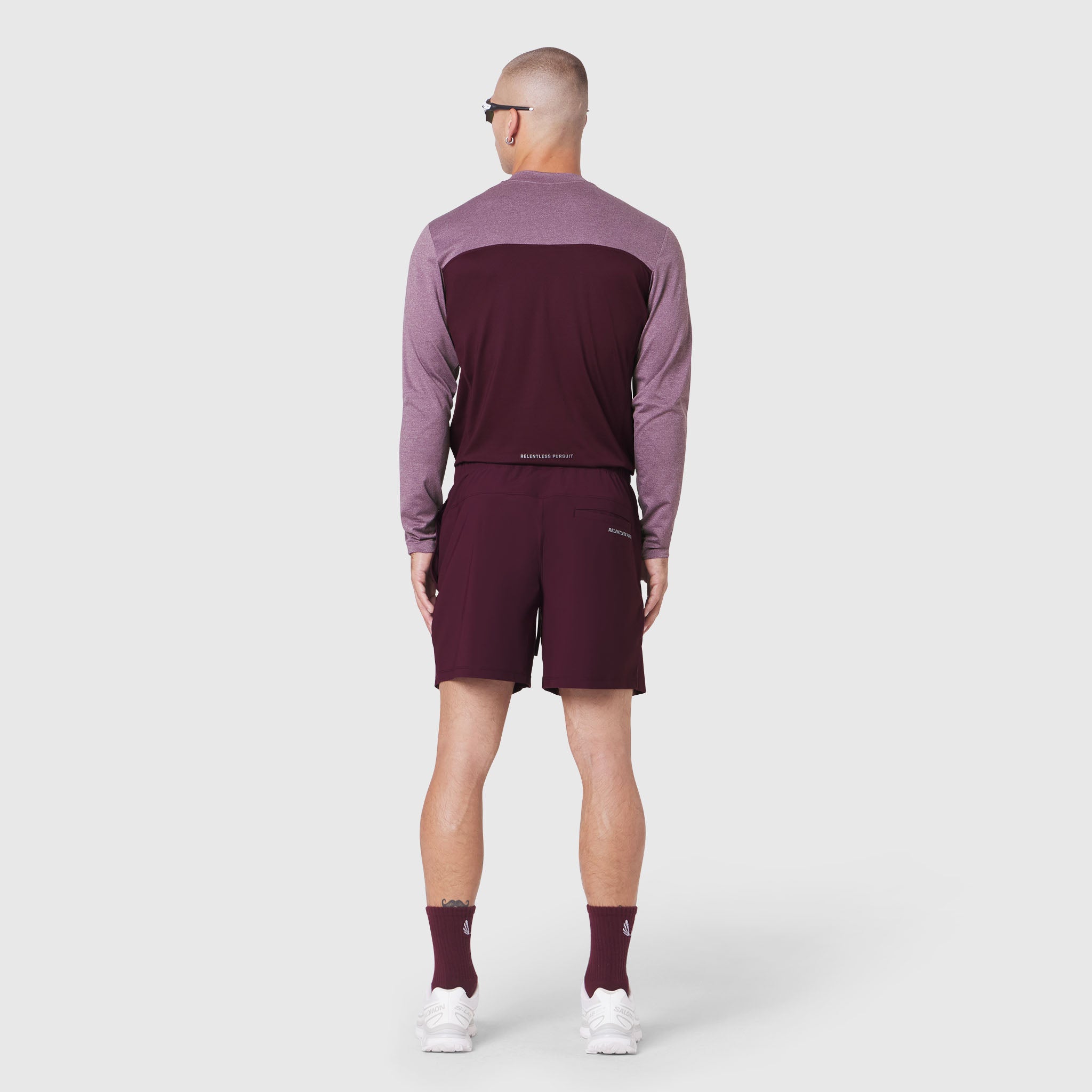 AEROSILVER® UPF50+ Run Long Sleeve in merlot with matching shorts, back view on model