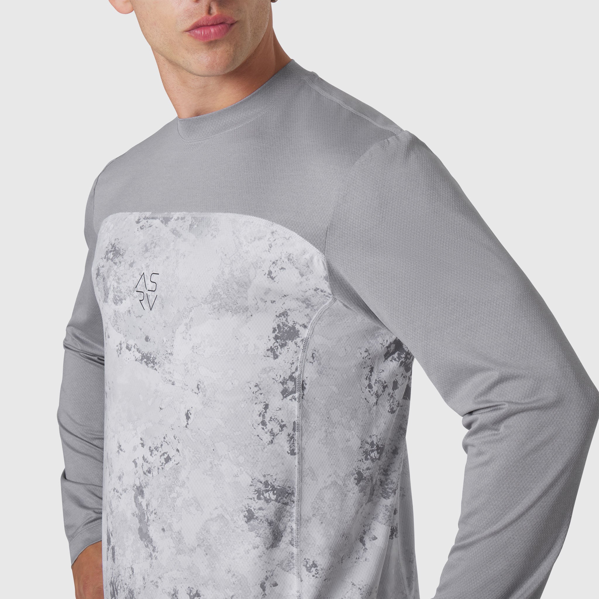 AEROSILVER® UPF50+ Run Long Sleeve in Sedona Snow Camo worn by model, side view