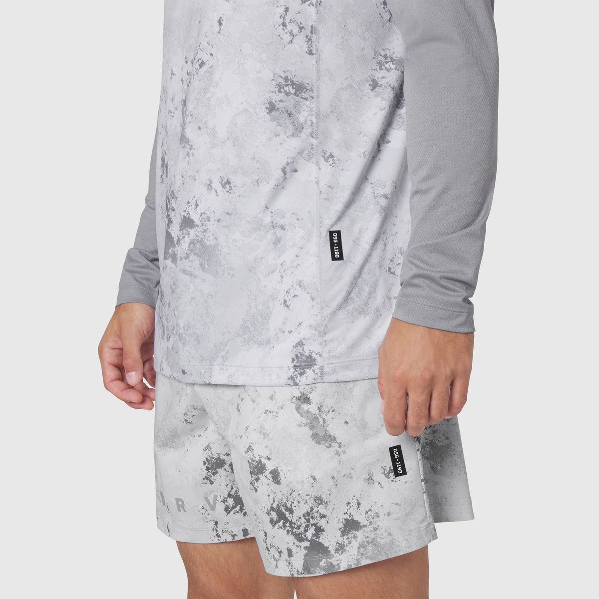 AEROSILVER® UPF50+ Run Long Sleeve in Sedona Snow Camo worn by model, side view