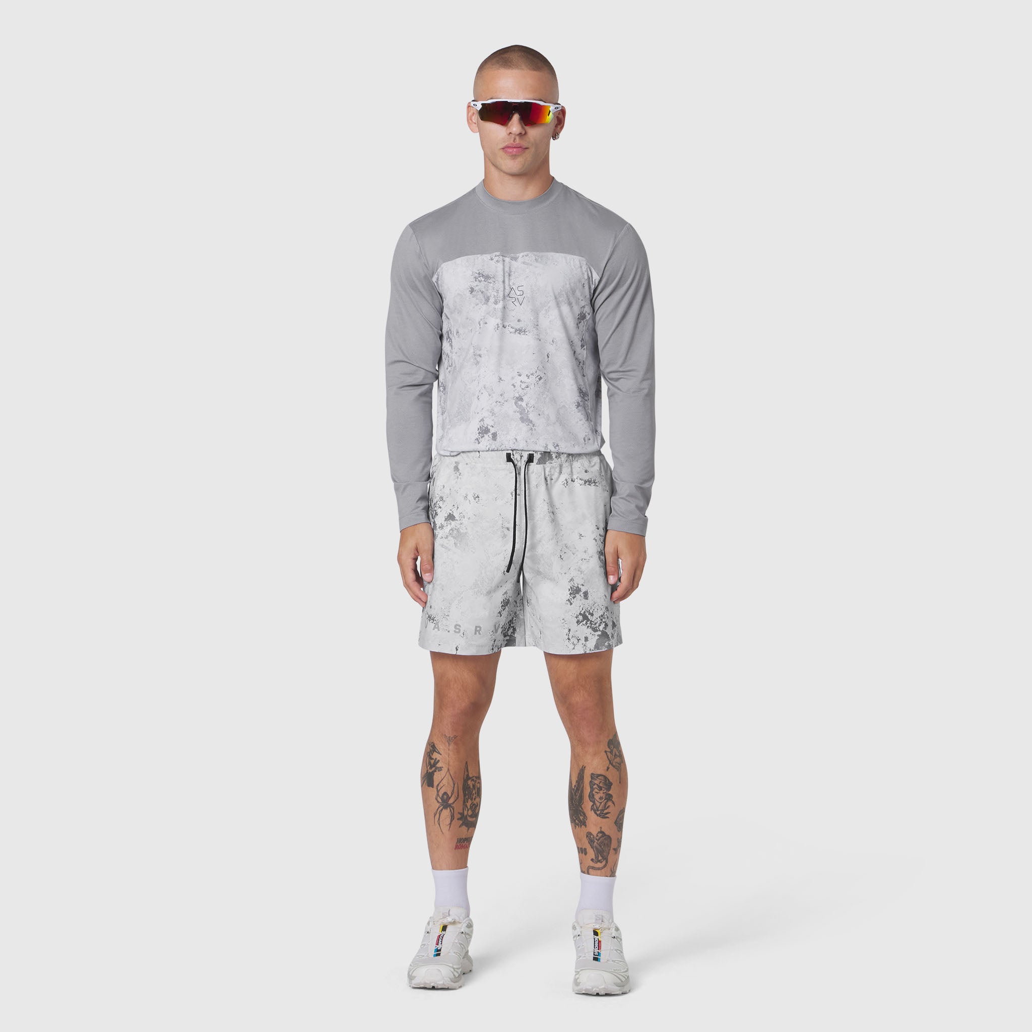AEROSILVER® UPF50+ Run Long Sleeve in Sedona Snow Camo worn with matching shorts, front view