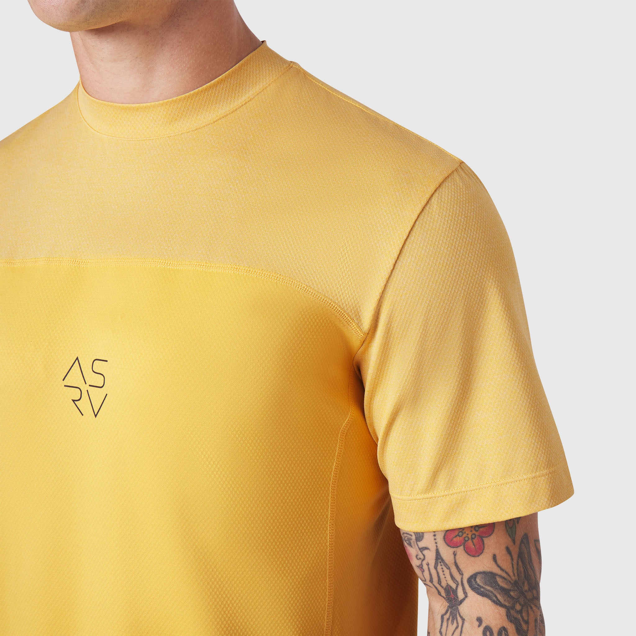 AEROSILVER® UPF50+ Run Tee in amber yellow worn by male model, front view