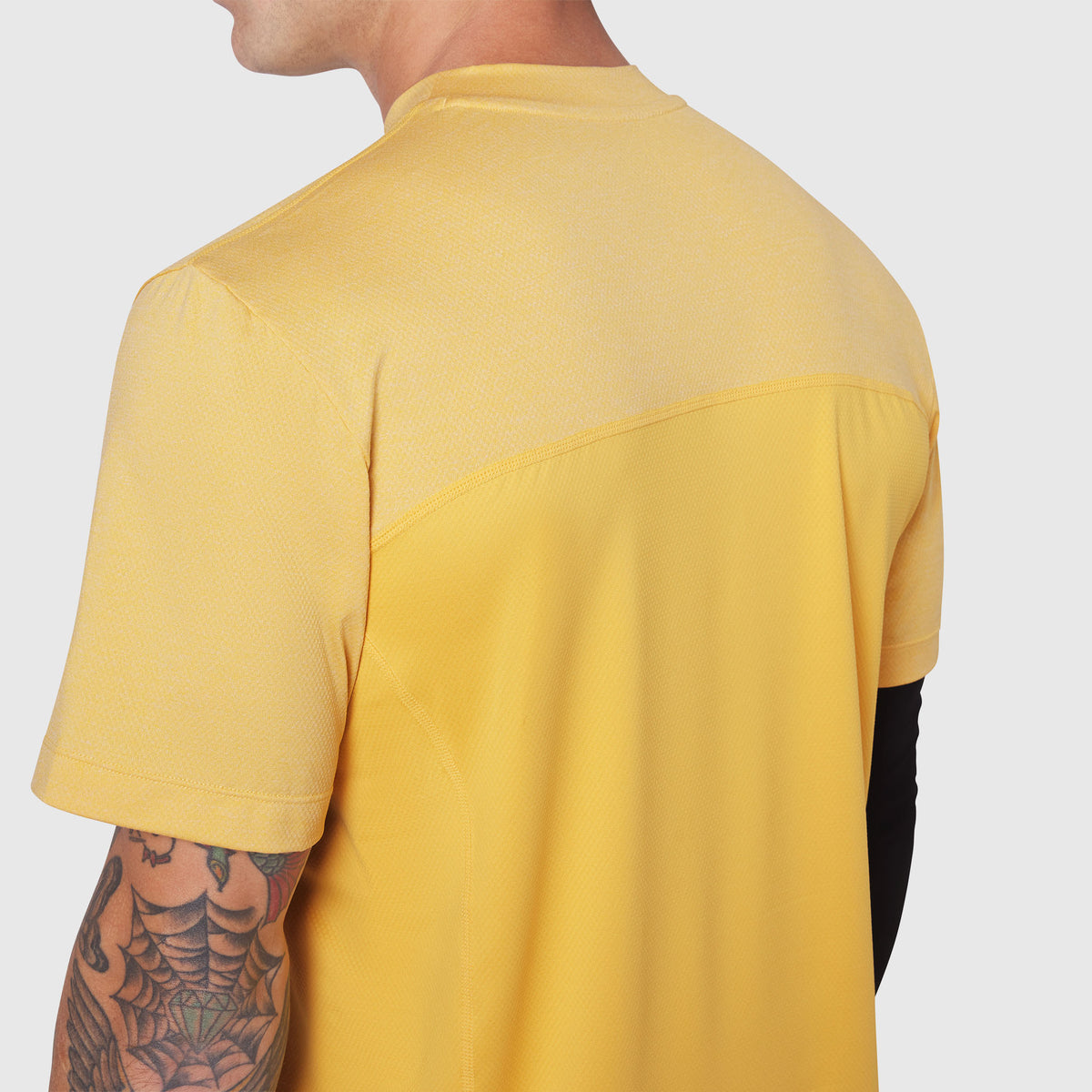 AEROSILVER® UPF50+ Run Tee in amber, back view on model