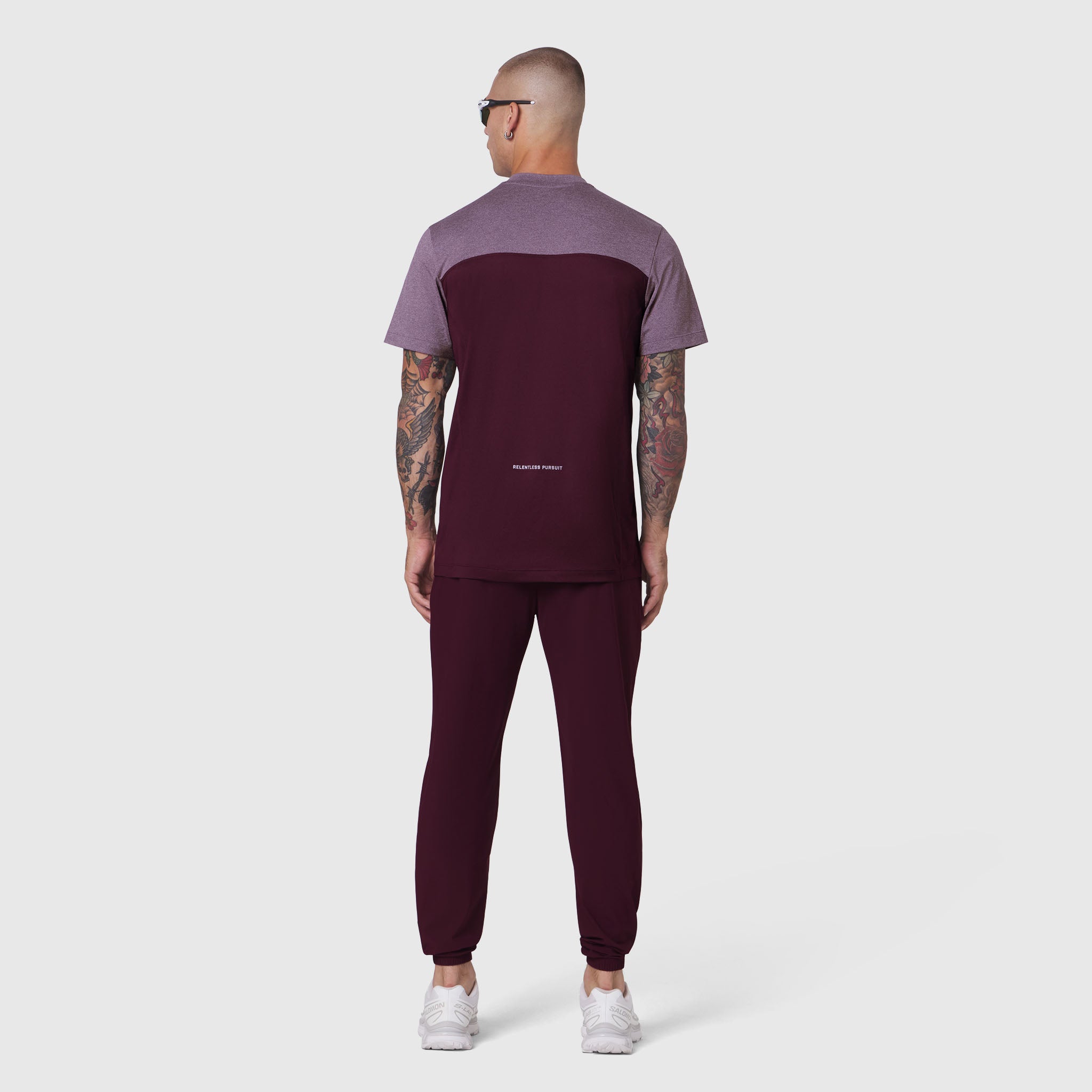 AEROSILVER® UPF50+ Run Tee in merlot with mauve shoulders, back view on model