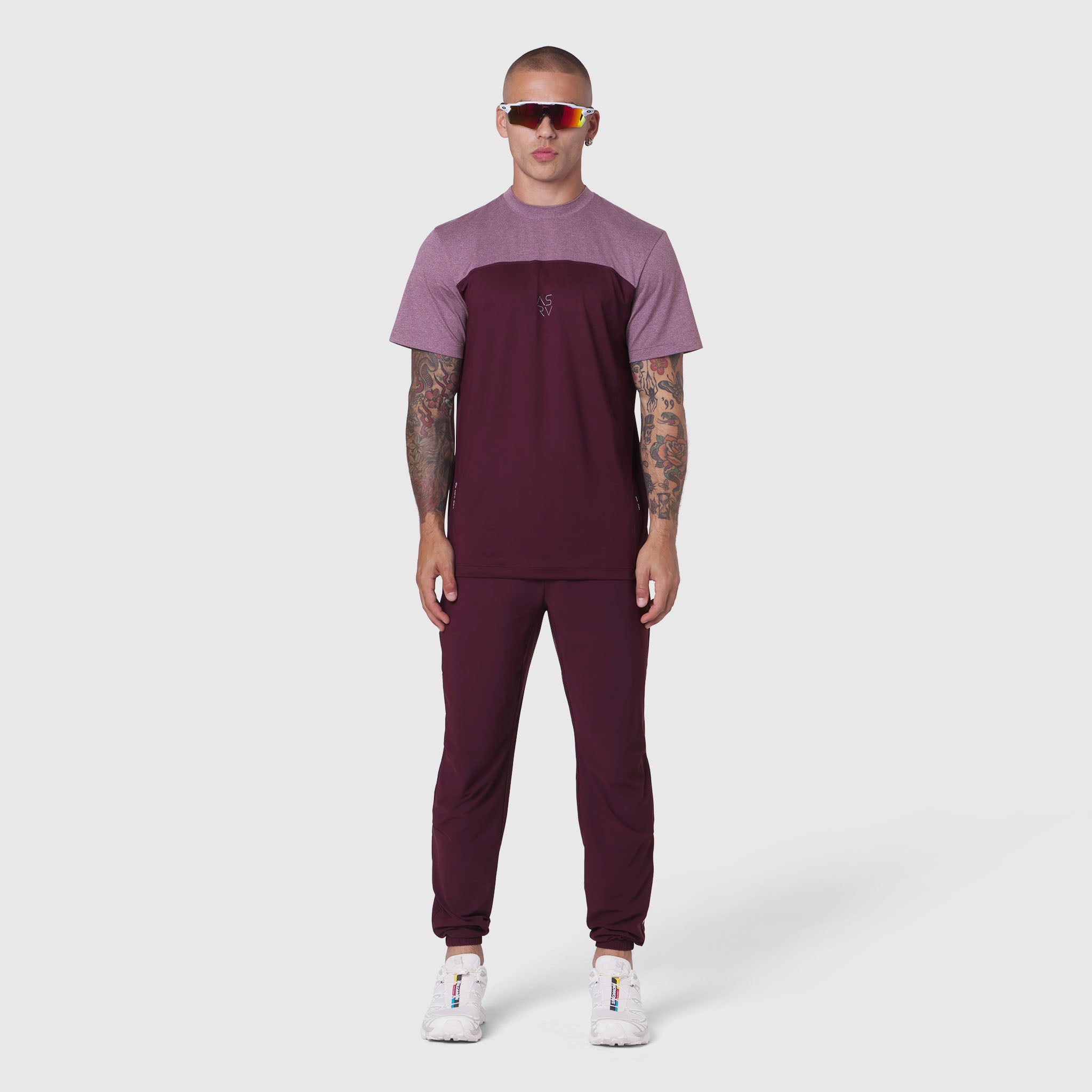 AEROSILVER® UPF50+ Run Tee in merlot and mauve colorblock, worn by model standing against white background